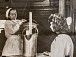 В молокоприемной колхоза «Красное знамя» Вологодского района. Сдает молоко доярка Опарина. 1957 