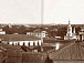 Панорама набережной реки Вологды с церковью в честь прп. Димитрия Прилуцкого на Наволоке. На втором плане - Спасо-Прилуцкий монастырь. Фото 1880-х годов.
