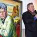 На творческой встрече рядом с своим портретом кисти В. Корбакова